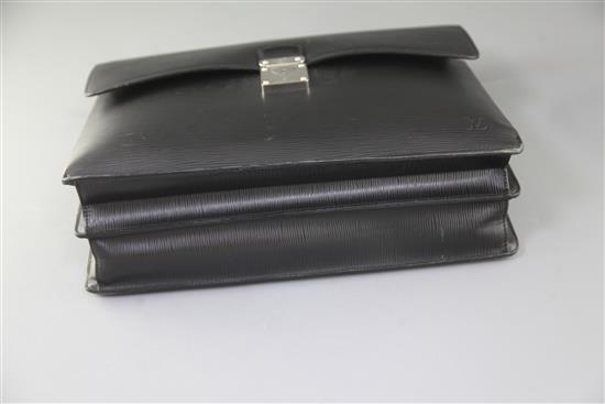 A Louis Vuitton black textured leather attaché case, 16.5in., with slip cover